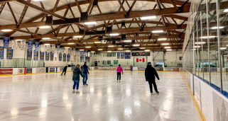 people skating on ice surface